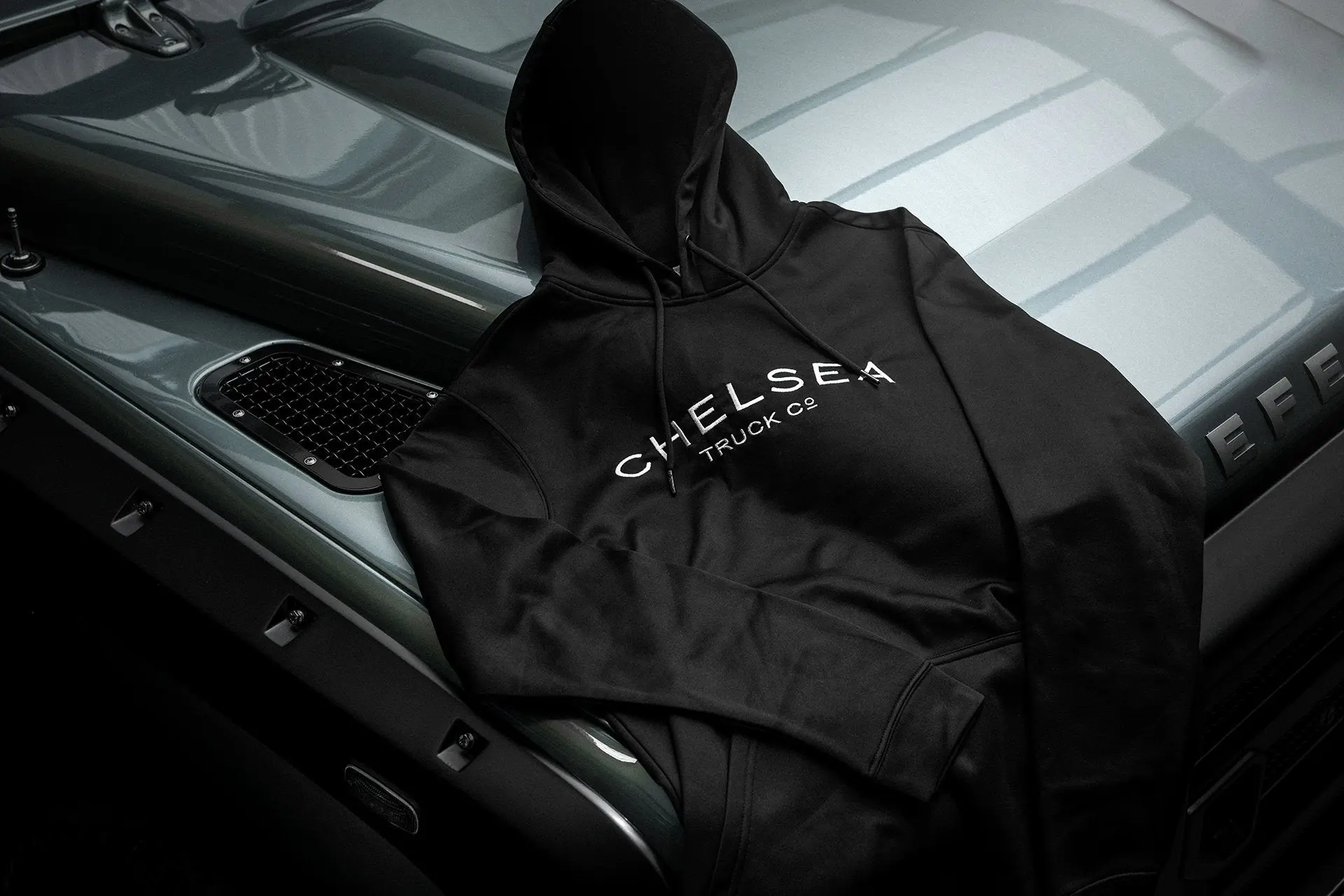 Women's Black with White Embroidery Chelsea Truck Co Hoodie